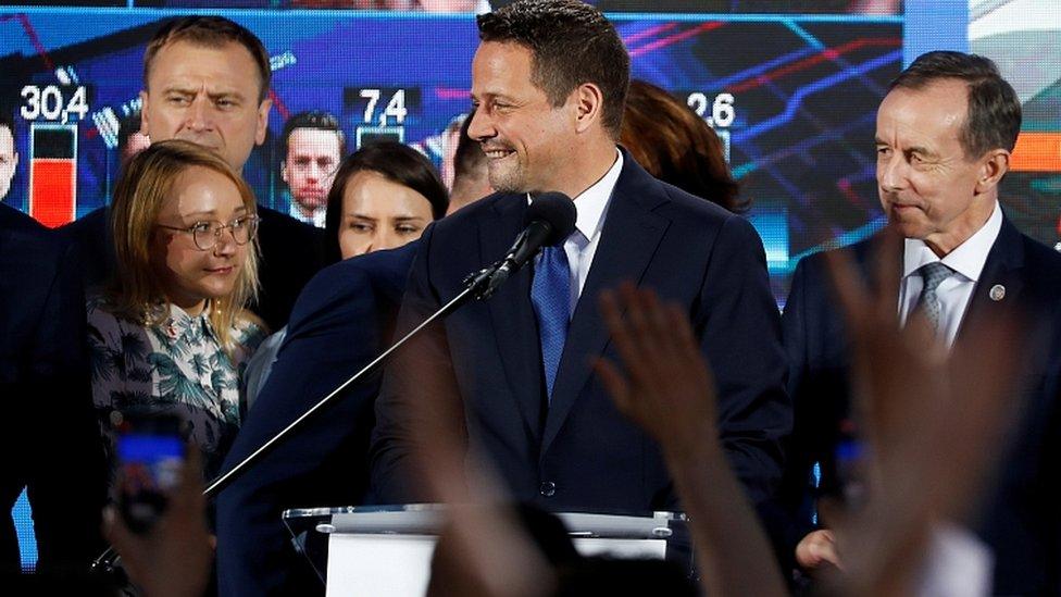 Rafal Trzaskowski of the main opposition Civic Platform party, reacts after the exit poll in Warsaw, Poland, June 28, 2020