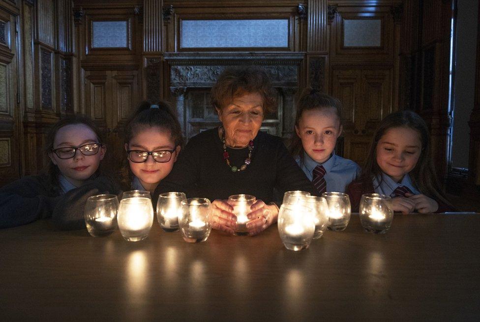 Year 7 students from St Timothy's Primary School with Holocaust survivor Janine Webber during the "Stand Together" Glasgow Schools" Holocaust Memorial event at Glasgow City Chambers.