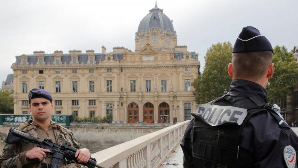 French police secure the area in front of the Paris Police headquarters in Paris, France, 3 October 2019.