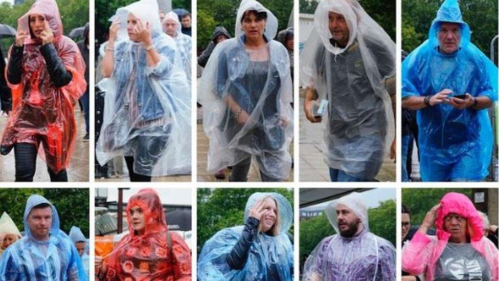 People wearing rain coats