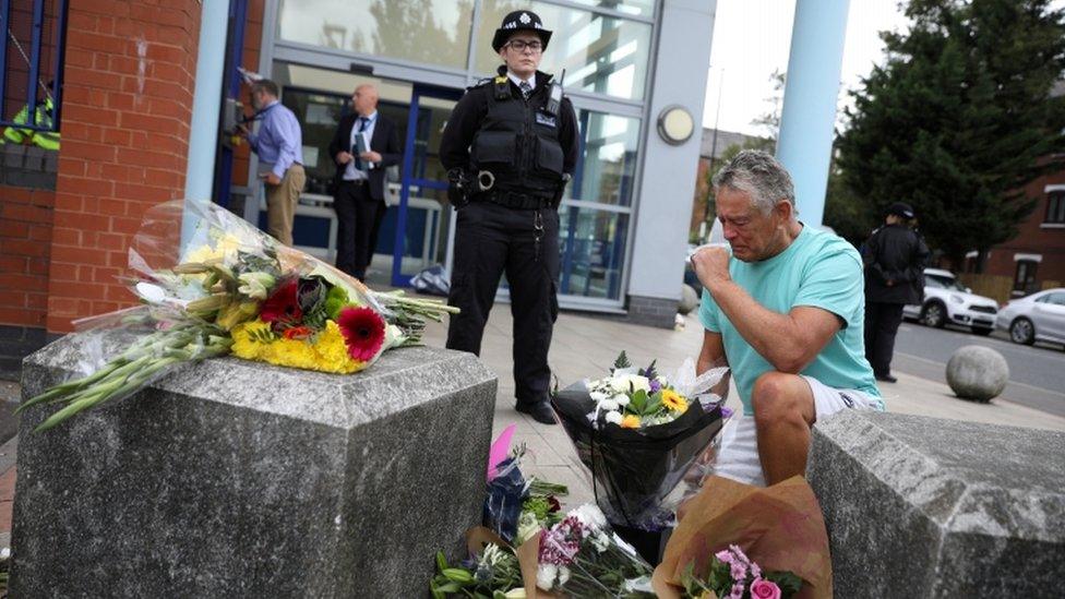 Man crying at scene