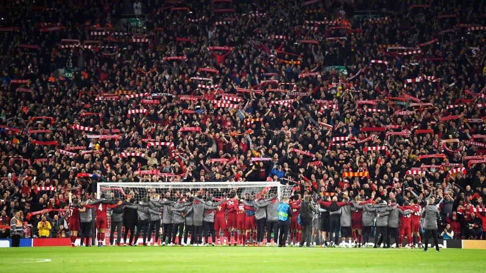 Liverpool players and fans after their Champions League heroics