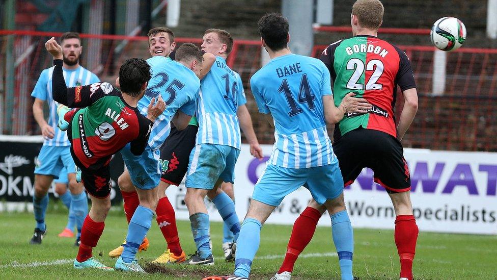 Curtis Allen scores the second of his two goals in Glentoran's 2-1 home win over Warrenpoint Town