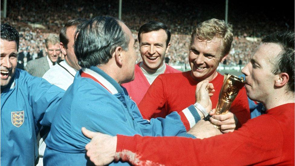 Bobby Moore with Alf Ramsey and the Jules Rimet World Cup trophy England 1966