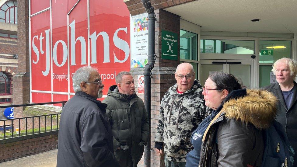 Traders outside St John's