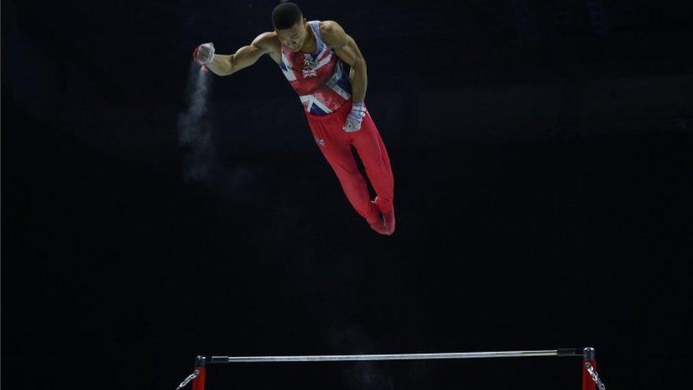 Joe Fraser on the horizontal bar