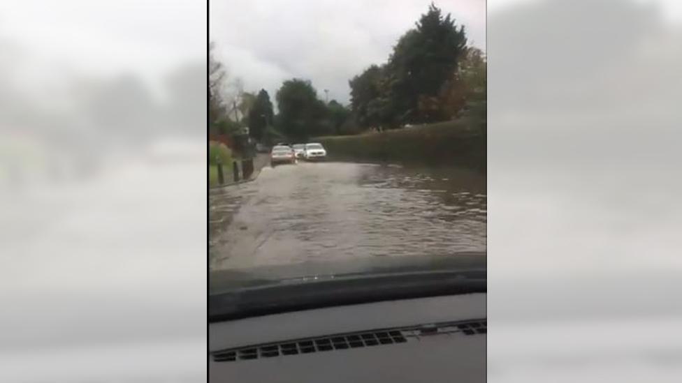 car driving through water