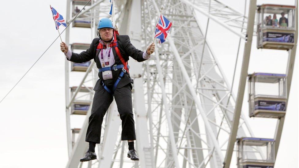 Boris Johnson stuck on a zip wire in July 2012 (file photo)