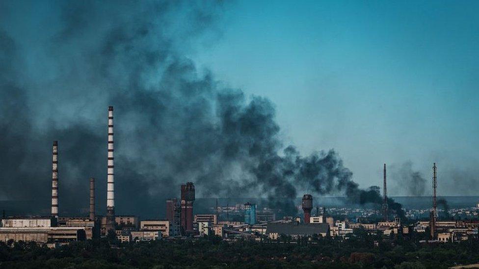 Smoke rises above the eastern Ukrainian city of Severodonetsk