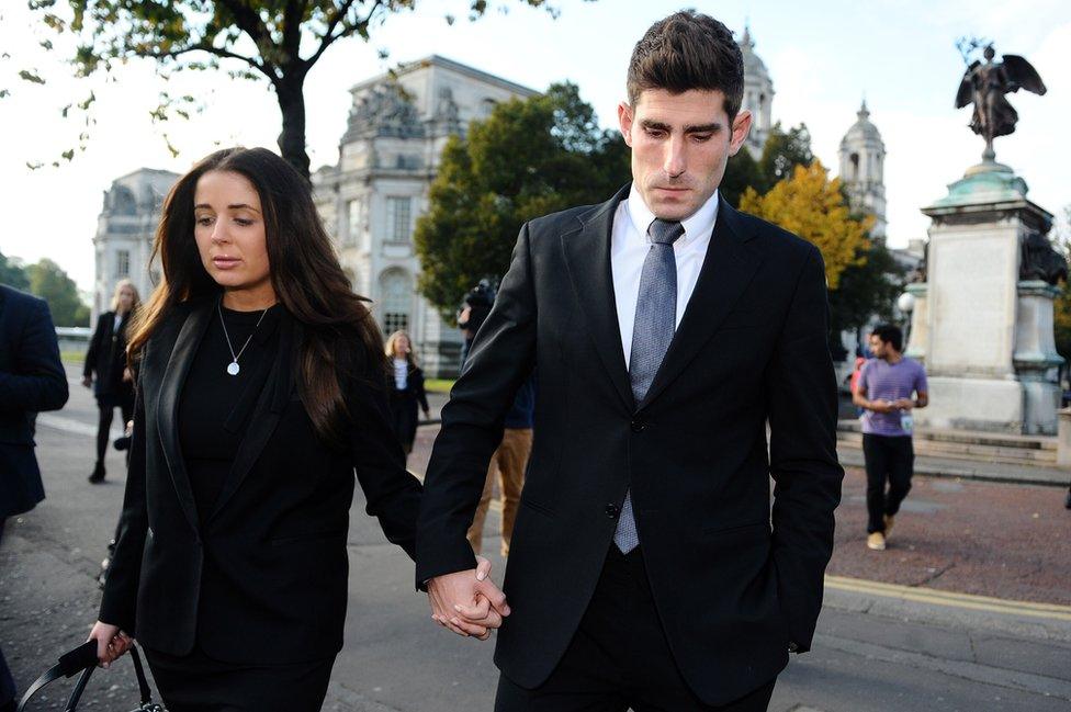 Ched Evans leaves court with his fiancée Natasha Massey