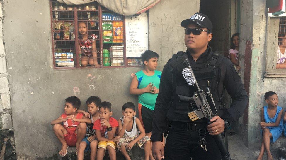 Policeman with Duterte badge