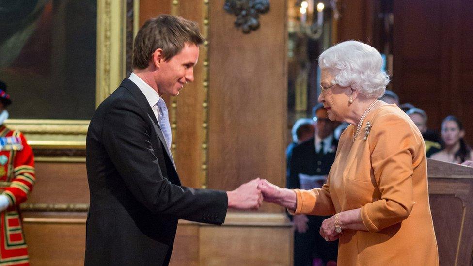 Eddie Redmayne and HM Queen