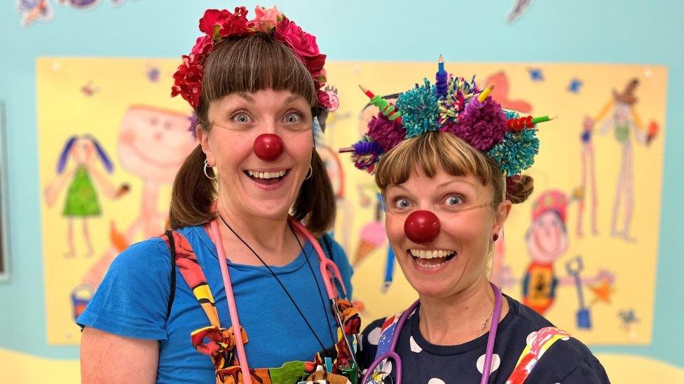 Lucy Enskat and Dot Howard performing as doctor clowns