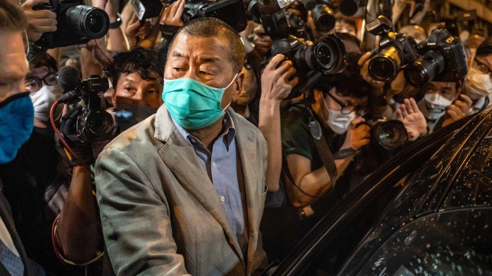 Jimmy Lai leaving police station last month