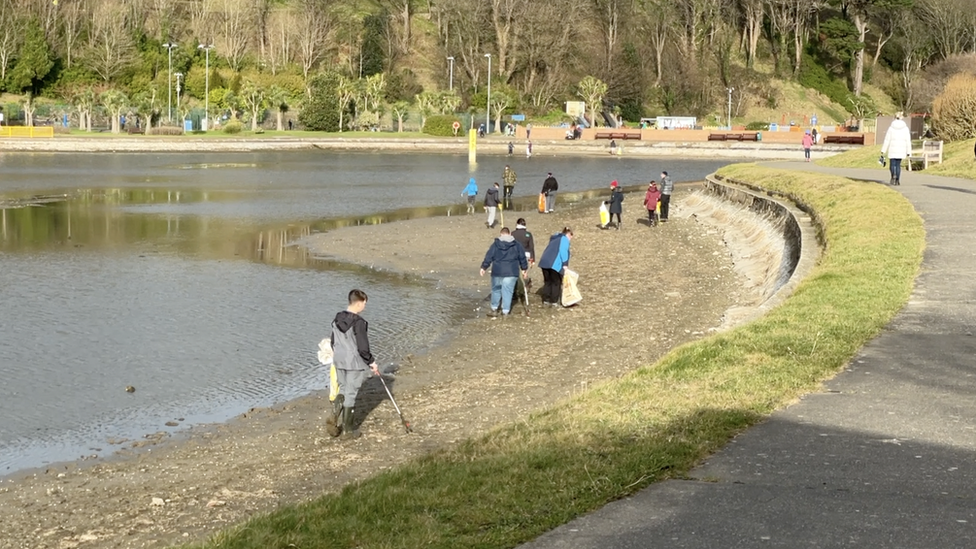 Beach Buddies volunteers in the drained Mooragh Lake