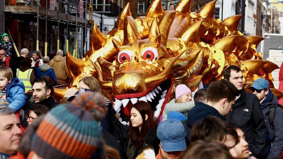 People take part in a parade during celebrations of the The Lunar Chinese New Year of the Dragon in London, Britain February 11, 2024.