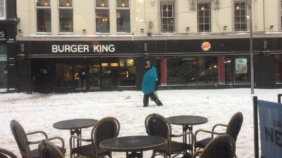 Homeless man with sleeping bag