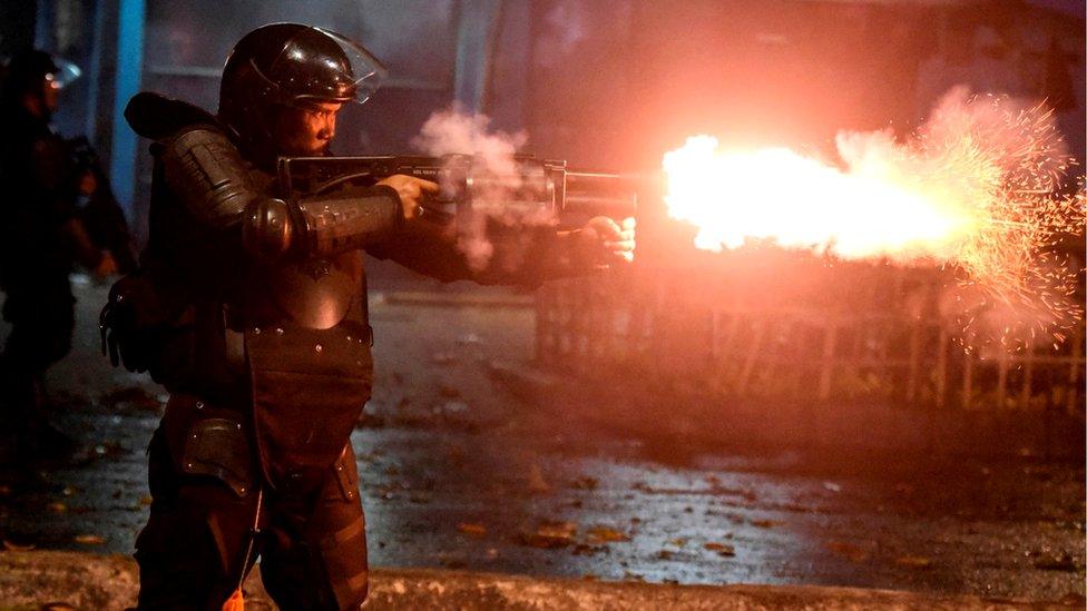 Police fire tear gas at protesters in Tanah Abang, Jakarta, Indonesia, early May 22, 2019