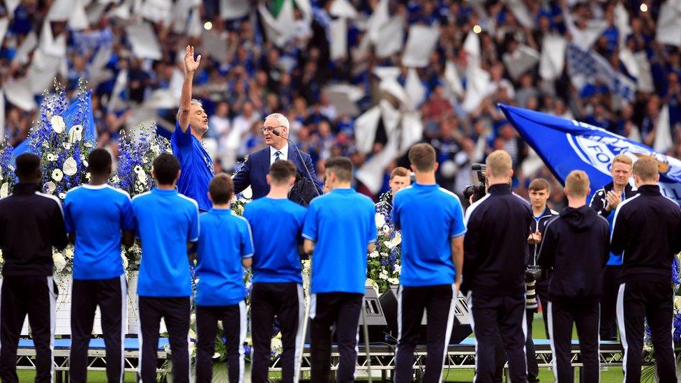 Andrea Bocelli performs next to Leicester City manager Claudio Ranieri before the match