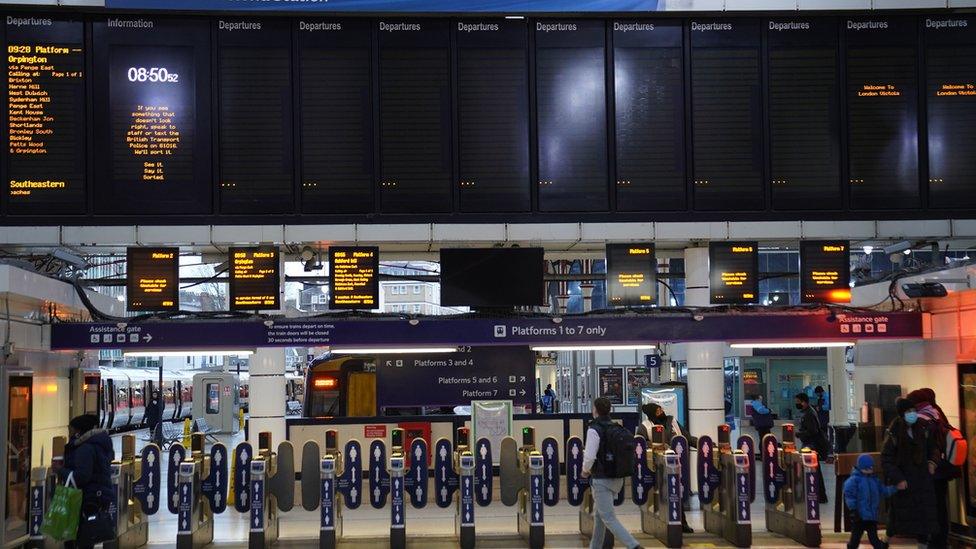 Blank train timetable display screens at Victoria train station, central London, as rail passengers are hit by disruption on the first working day of the year