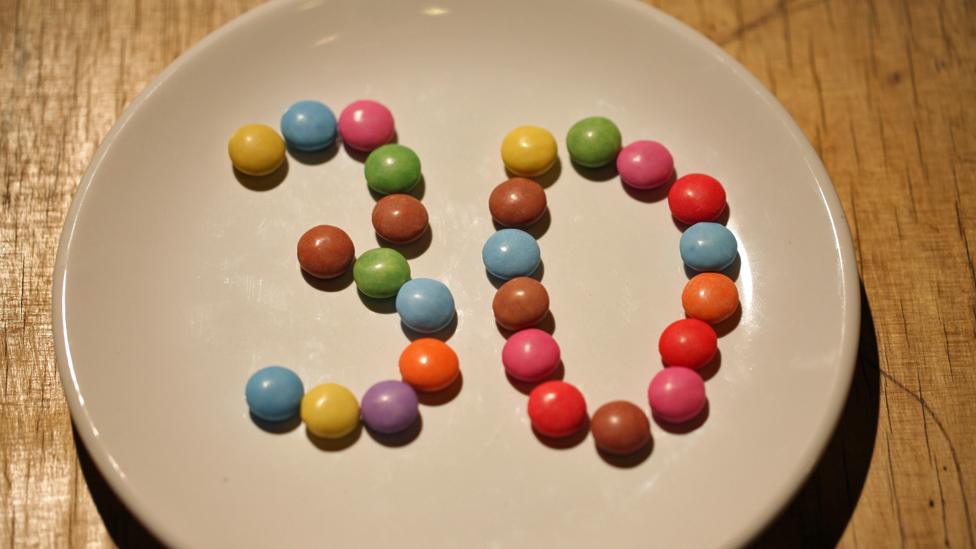 Smarties spell out "30"