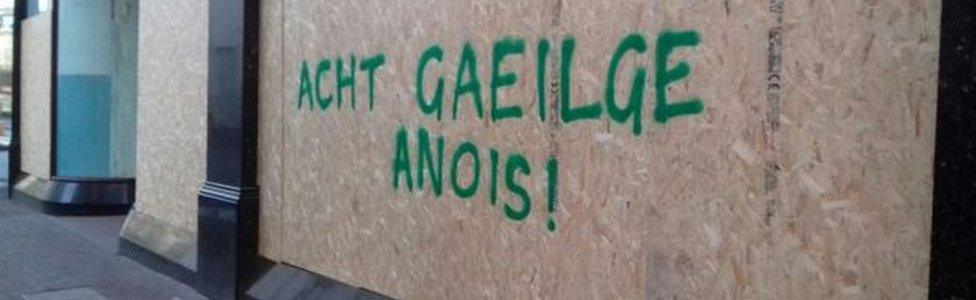 Graffiti in Belfast calling for an Irish language act