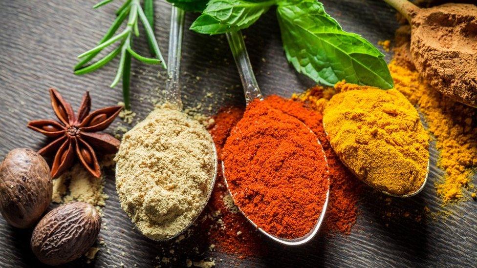 Spices displayed on spoons