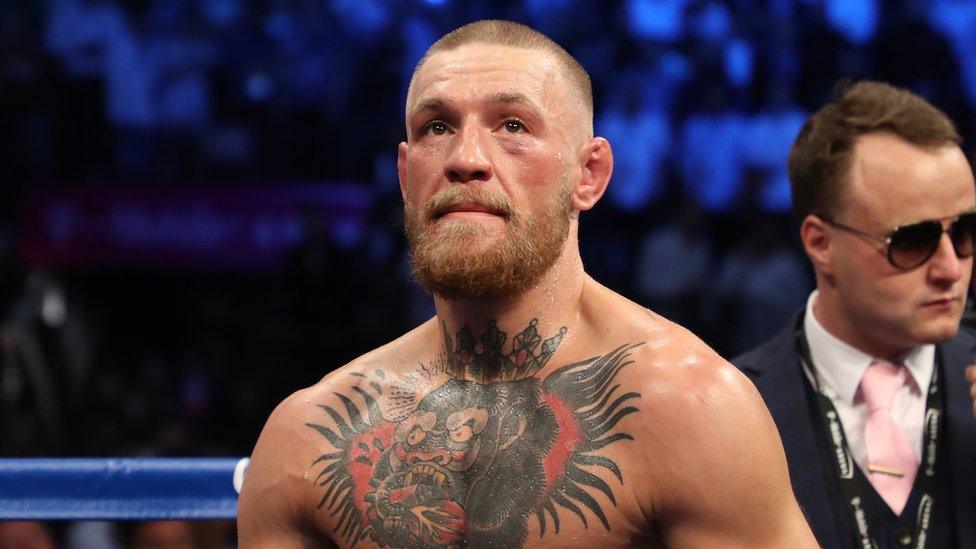 Conor McGregor pictured after being defeated by Floyd Mayweather Jr. in August 2017