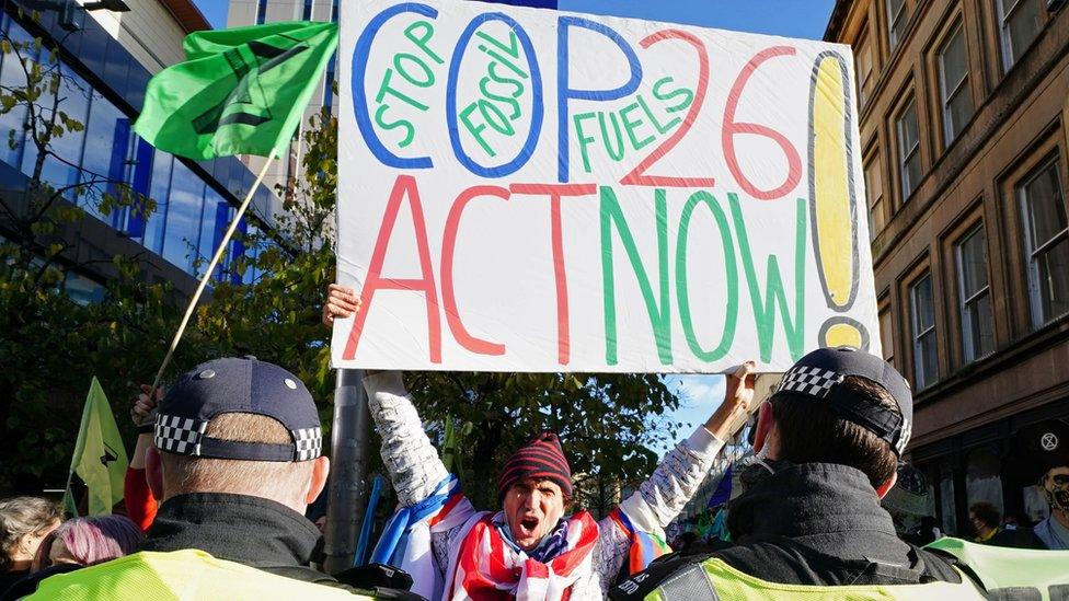 Protester at an Extinction Rebellion demonstration in Glasgow on 3 November 2021