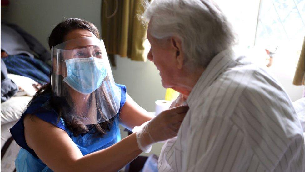 Picture of an elderly patient being looked after