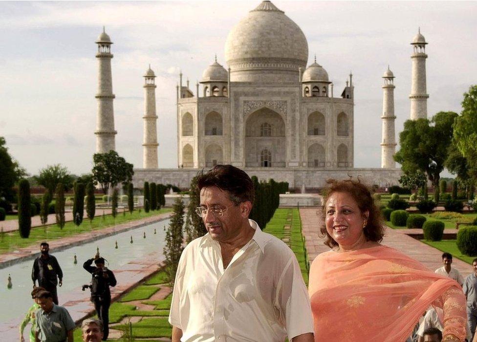 Pakistan President Pervez Musharraf and his wife Sebha leave the 17th Century Taj Mahal on 15 July 2001 in Agra.