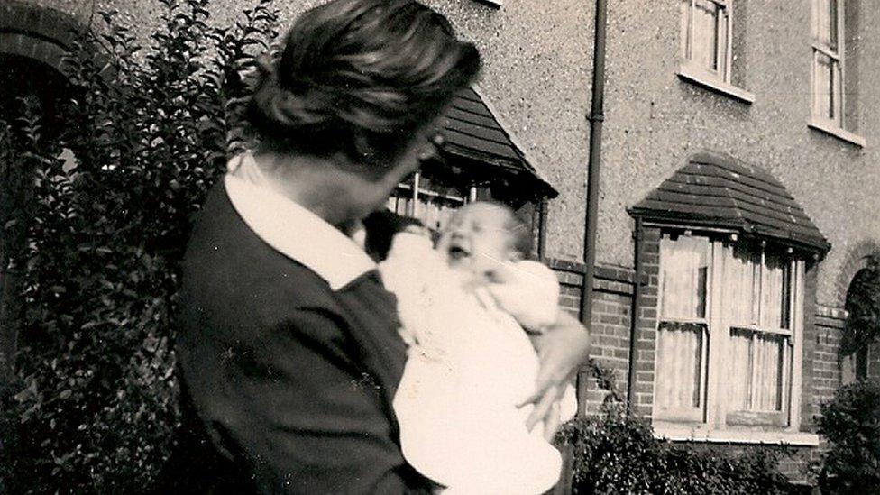 Kevin Crossland pictured with his grandmother in 1961, the year he was born