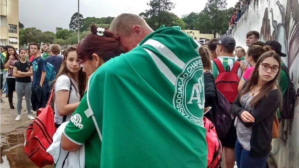 A handout picture made available by Diario do Iguacu shows supporters of the Chapcoense FC gathering at the club in Chapeco, Brazil, on 29 November 2016.