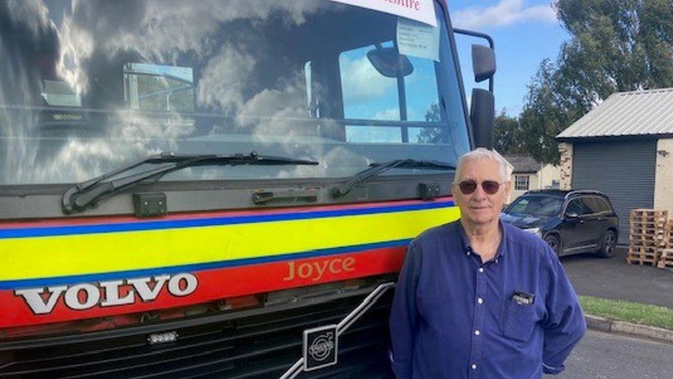 Bob Frendt next to fire engine