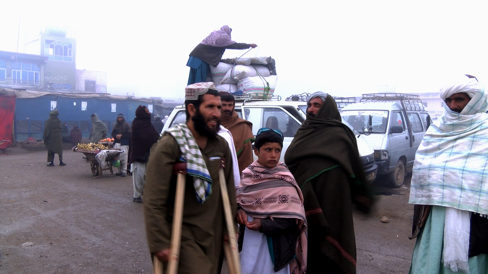 Ismat, a resident of embattled Sangin district on his way back home after being treated in Lashkar Gah for injuries sustained in crossfire