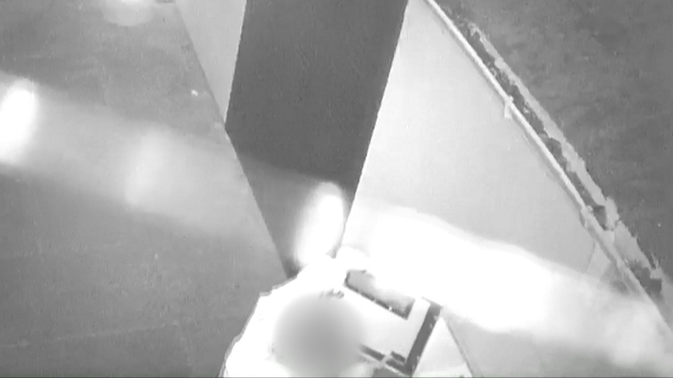 CCTV of a man vandalising debirillator