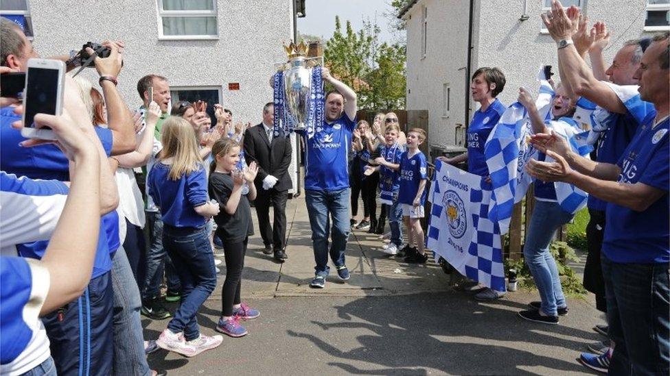 Steve Worthy handed trophy