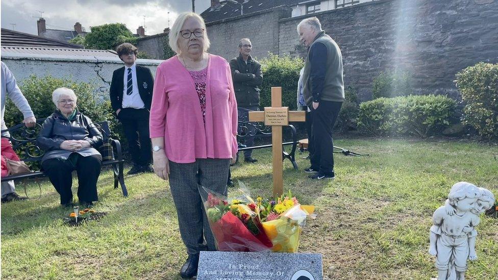 Helen Deery standing at the remembrance garden in Londonderry