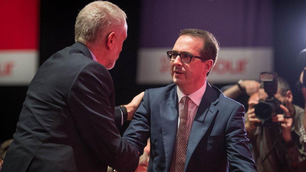 Owen Smith congratulates Jeremy Corbyn after the election result was announced