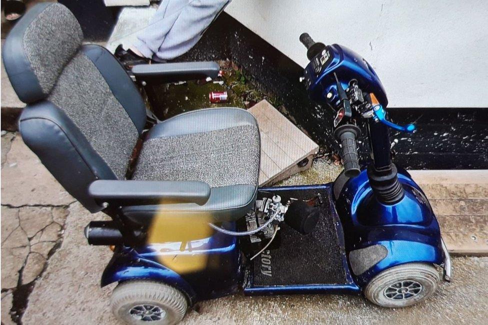 Mobility scooter fitted with engine