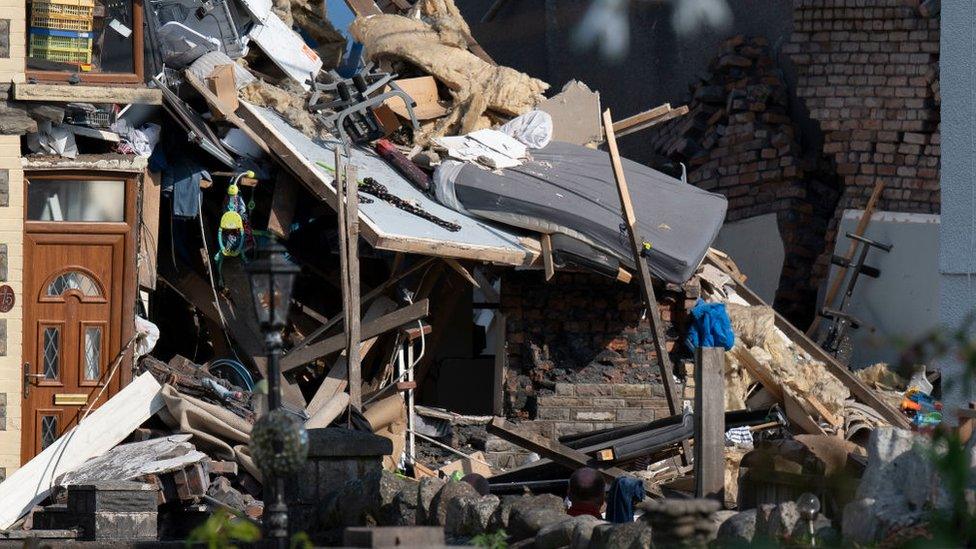 Debris strewn among the remains of the terraced house destroyed in an explosion in Seven Sisters, Neath Port Talbot