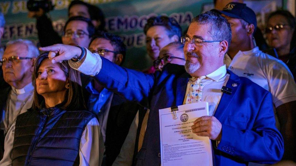 Guatemalan President-elect Bernardo Arevalo gestures on the day he delivers a speech to supporters during a protest outside the Supreme Court of Justice (CSJ), after he temporarily suspended his participation in the government transition following a raid on electoral facilities by the top prosecutor's office, in Guatemala City, Guatemala September 18, 2023.