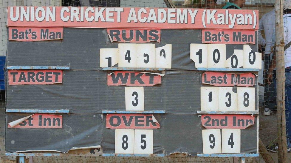 A scoreboard in India displays the tally from a record-breaking innings