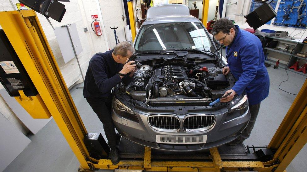 engine being repaired in workshop