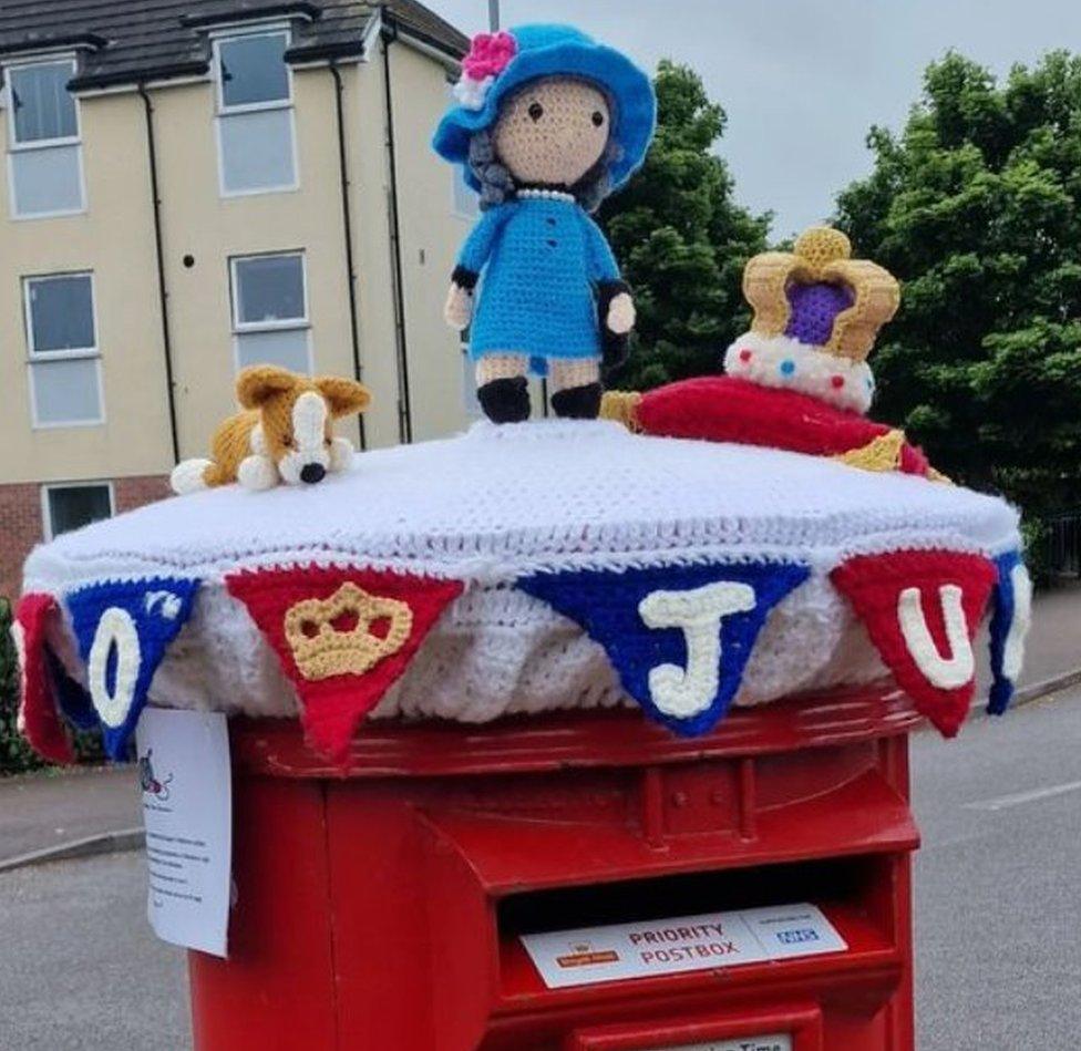 Post box topper by Westbury Yarn Bombers in Westbury