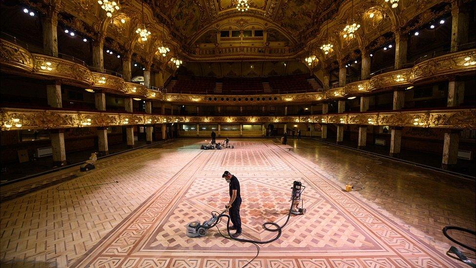 Henry Armitage, a wood sanding technician, working to restore the floor of the historic Blackpool Tower Ballroom