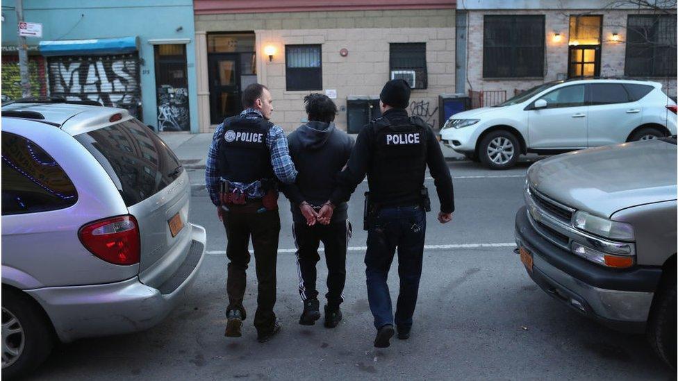 U.S. Immigration and Customs Enforcement (ICE), officers arrest an undocumented Mexican immigrant during a raid in the Bushwick neighborhood of Brooklyn on April 11, 2018 in New York City