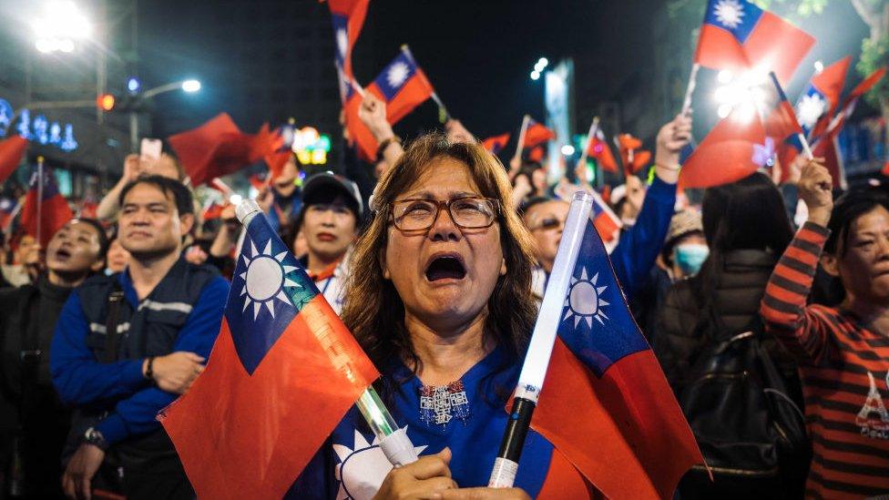 Supporters of Han Kuo-Yu react during a rally outside the campaign headquarters on January 11, 2020 in Kaohsiung,