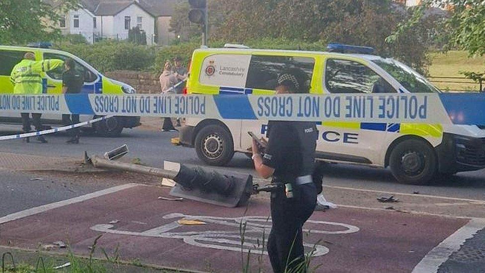 police vans at scene after crash