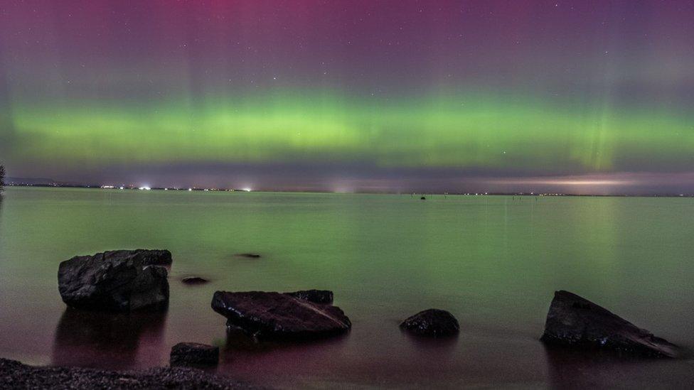 The green lights projected onto the south side of Lough Neagh in County Armagh